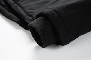 Close-up of windproof jacket with thick ribbed cuffs for winter warmth and comfort