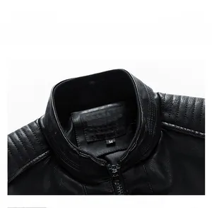 Detail view of black faux leather motorcycle jacket collar and quilted shoulder texture