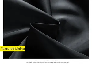 Detail of premium black twill lining fabric with smooth texture on a motorcycle jacket