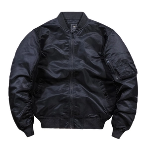 Detail view of MA-1 flight jacket with ribbed collar and classic arm utility pocket