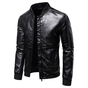 Detail of black faux leather jacket featuring contrast white stitching and ribbed collar