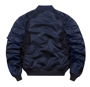 Back view of a navy blue bomber jacket showing windproof fabric and ribbed hem details