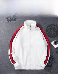 Close-up of white sports jacket with red and black side stripes and ribbed cuffs