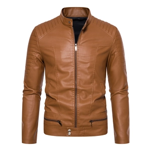 Detail of dark brown faux leather motorcycle jacket with quilted shoulders and snap collar