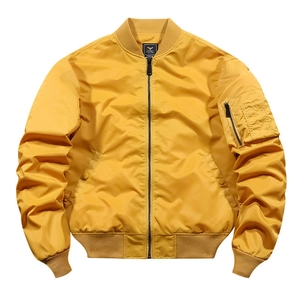 Detailed macro view of the MA-1 bomber jacket sleeve zipper pocket and satin fabric