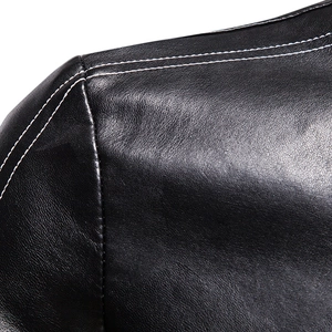 Detail of premium black leather jacket shoulder with precise white double stitching