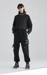 Urban techwear men's black cargo pants with tactical pockets and drawstring waist