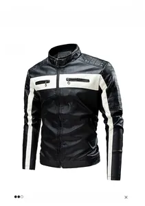 Close-up of black and white biker jacket showing stitched shoulder detail and faux leather