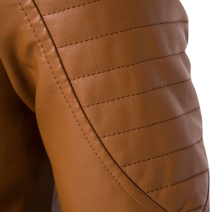 Close-up of brown PU leather jacket shoulder with detailed parallel quilted stitching