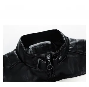 Close-up of faux leather jacket collar with metal zipper and buckle detail
