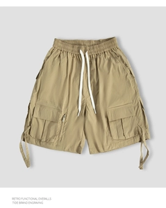 Front view of khaki retro cargo shorts featuring multiple functional pockets and white drawstring