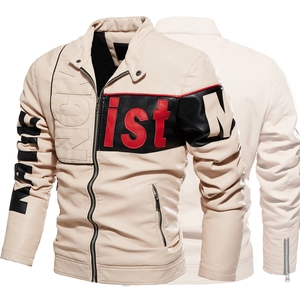 Detailed view of beige faux leather jacket featuring black color block and ist embroidery
