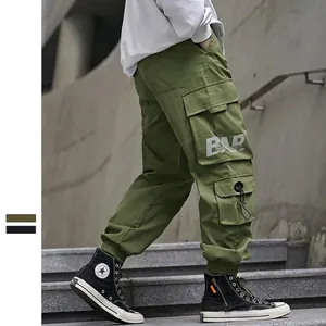 Men's olive cargo pants with multiple pockets and functional street style design