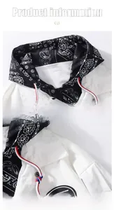 Detail of hoodie with paisley print lining and tri-color drawstring for baseball jacket