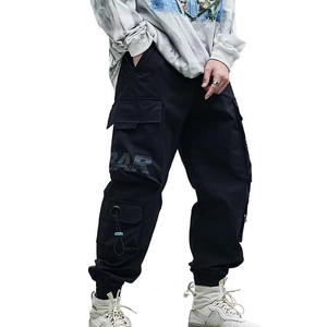 Black multi-pocket cargo pants with RAD ORIGINAL DESIGN print and cuffed ankles