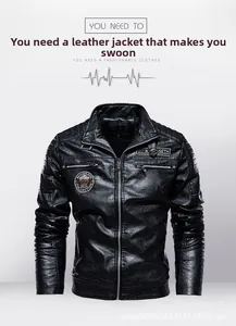 Detailed view of motorcycle leather jacket with quilted shoulders and embroidered badges