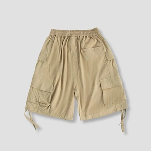 Khaki cargo shorts with multiple pockets, elastic drawstring waist, and tactical functional style
