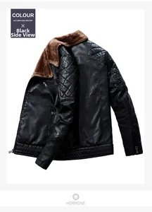 Detail of quilted shoulder stitching and metallic zippers on black faux leather jacket