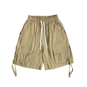 Men's khaki multi-pocket tactical cargo shorts with elastic drawstring waist in street style