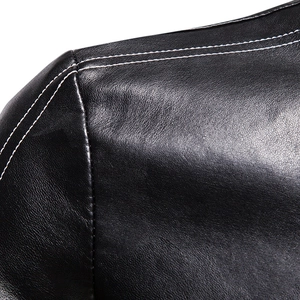Close-up of black PU leather jacket shoulder with premium lychee texture and white stitching