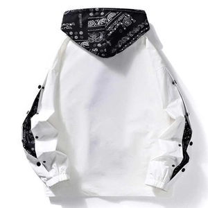 White street-style hooded baseball jacket with black paisley patchwork sleeves and buttons