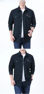 Detail of navy blue fleece-lined work shirt featuring twin chest pockets and Outdoor label