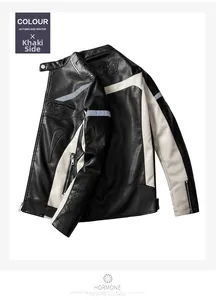 Close-up of khaki and black faux leather motor jacket with detailed texture and zippers