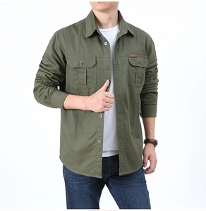 Detail view of army green fleece-lined shirt with double chest pockets and warm beige lining