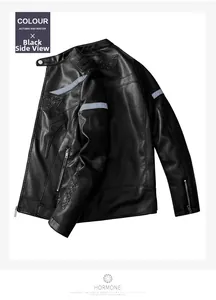 Detail of black motorcycle leather jacket with side zipper and reflective sleeve stripes