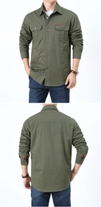 Detail view of army green outdoor work shirt featuring double chest pockets and red label
