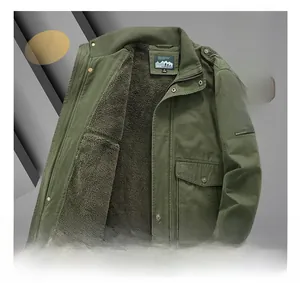 Detail showing thick dark brown fleece lining inside a green outdoor work jacket for men
