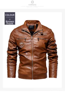 Detail of yellowish brown biker jacket showing quilted shoulders and metal zipper pockets