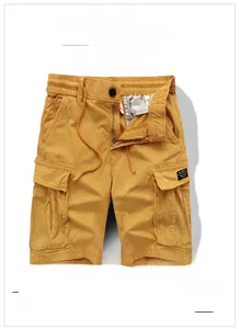 Detail shot of cargo shorts with elastic drawstring waist and side flap pockets