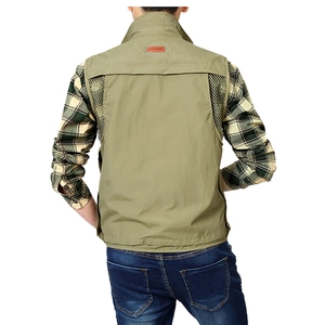 Detail view of quick-dry fishing vest with mesh back and red leisure label on khaki fabric