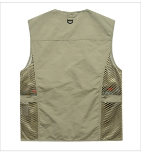 Detail view of breathable mesh back on multi-pocket fishing vest with functional D-ring