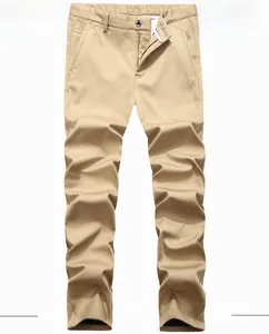 Detail of khaki men's casual straight trousers featuring durable cotton twill fabric