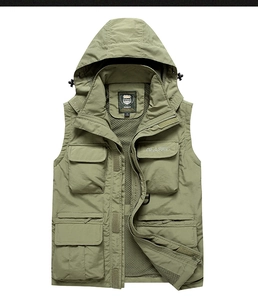 Detail of army green utility vest showing breathable mesh lining and classic embroidery