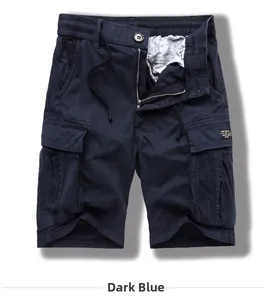 Detail of navy blue cargo shorts featuring elastic drawstring waist and side patch pockets