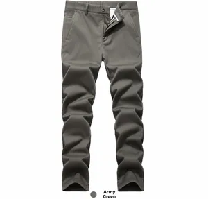 Detail of army green cotton pants showing the durable twill fabric and button zip fly