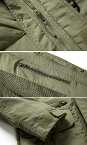 Detail view of army green tactical jacket featuring zipper, mesh lining, and velcro cuffs