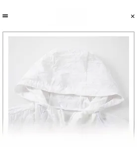 Detail of white hooded sun protection jacket showing zipper and textured breathable fabric