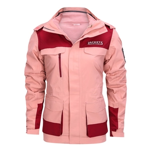 Detail of pink waterproof jacket featuring windproof flap and breathable chest pocket