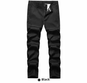 Detailed close-up of men's casual black trousers featuring a metal button and zip fly