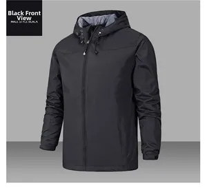 Detail view of black outdoor jacket featuring adjustable drawstring hood and velcro cuffs