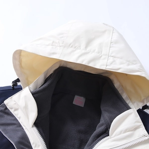 Detail view of 3-in-1 outdoor jacket with detachable fleece lining and adjustable hood