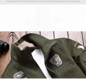 Close-up of military flight jacket featuring embroidered eagle patches and stand collar