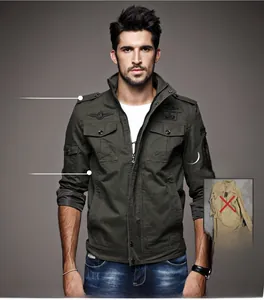 Detail view of military green cotton jacket with epaulettes and slim fit waist design