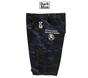 Detail of dark blue camo cargo shorts with side pockets and zip utility compartments