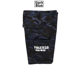 Detail view of dark blue camo cargo shorts with side pockets and white typography
