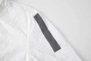 Men's breathable white sun protection jacket with reflective details and textured fabric